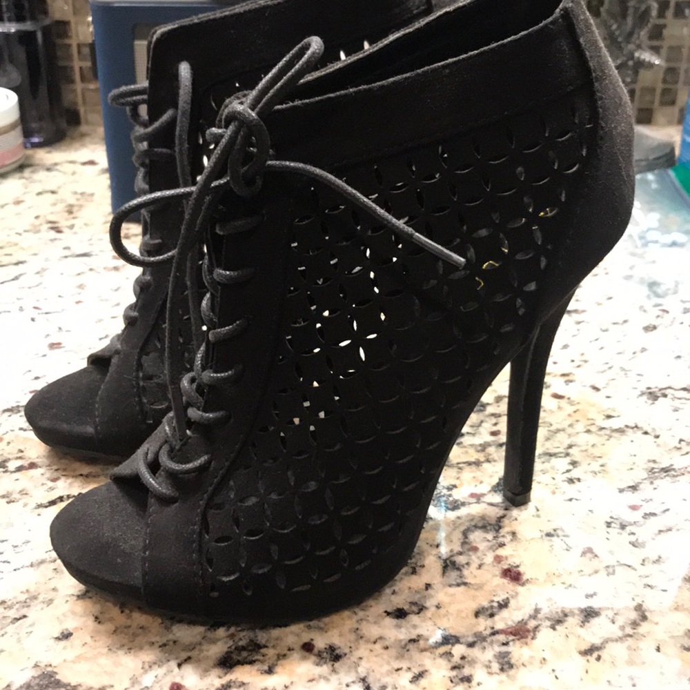 Never worn size7 laser cut heels
